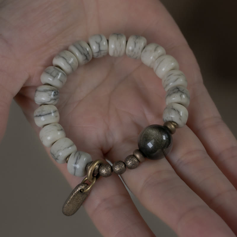 Karma Stone Tibetan Yak Bone Gold Sheen Obsidian Brass Bead Strength Bracelet