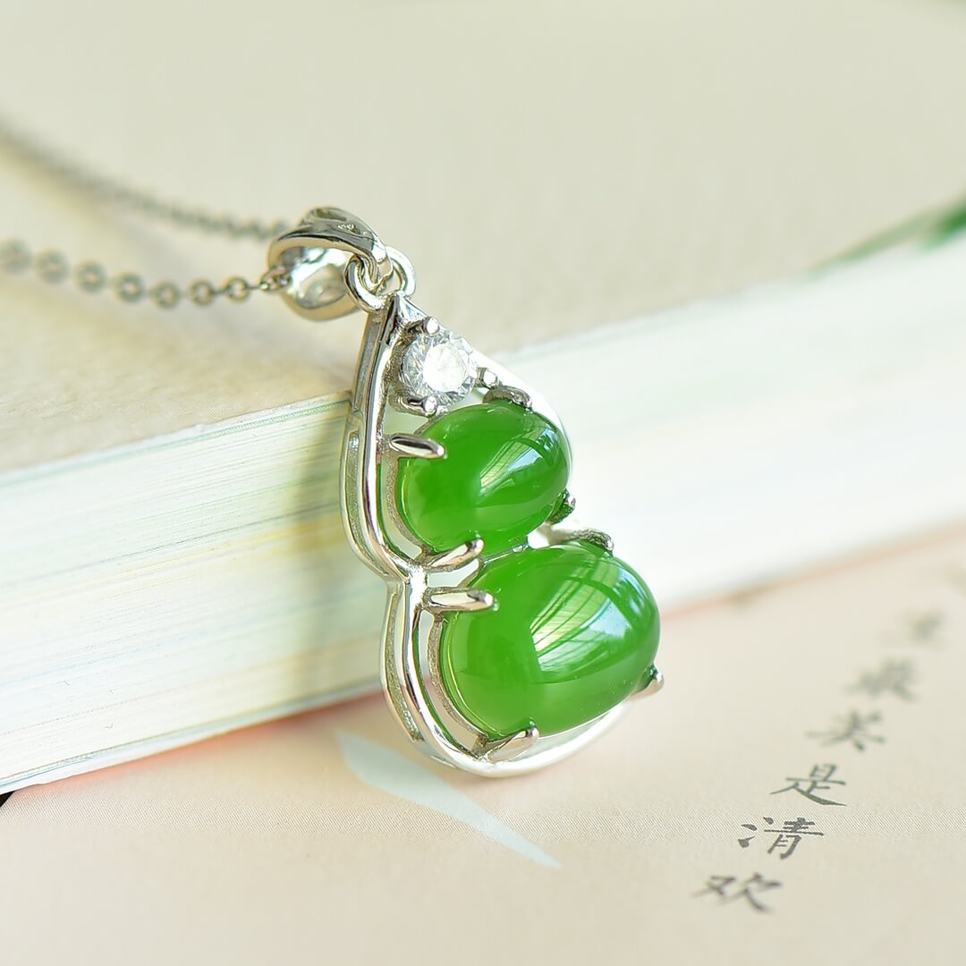 Sterling Silver Pendant with Hotan Jade Egg-Shaped Pendant