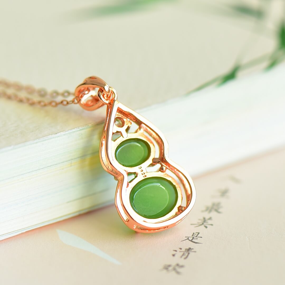 Sterling Silver Pendant with Hotan Jade Egg-Shaped Pendant