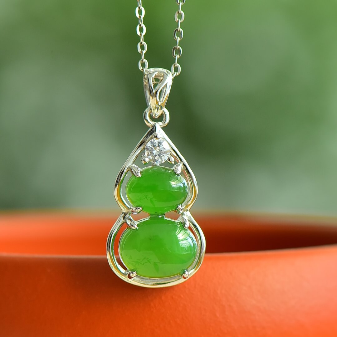 Sterling Silver Pendant with Hotan Jade Egg-Shaped Pendant