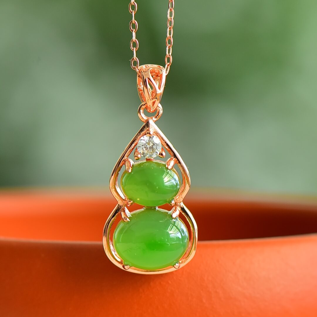 Sterling Silver Pendant with Hotan Jade Egg-Shaped Pendant