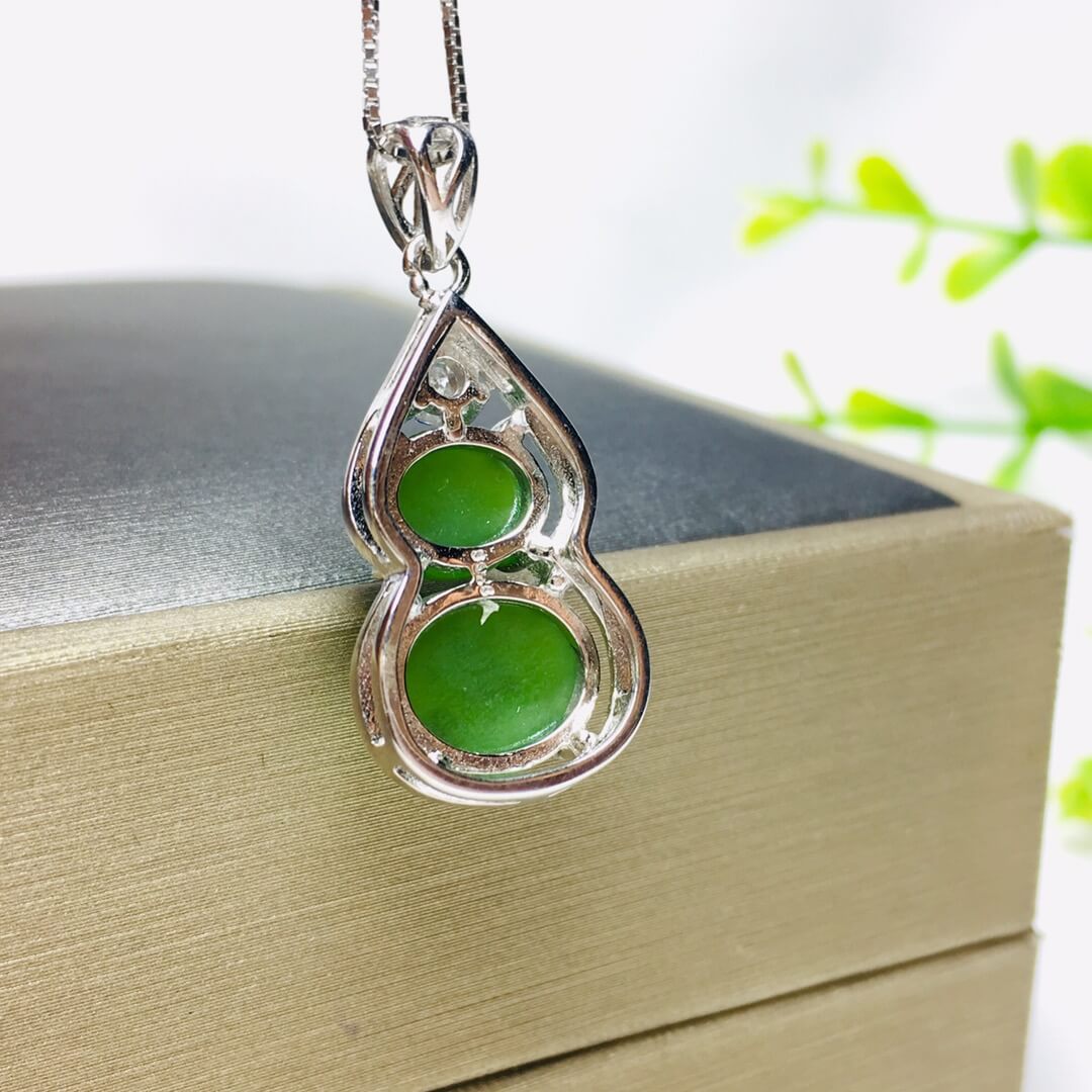 Sterling Silver Pendant with Hotan Jade Egg-Shaped Pendant