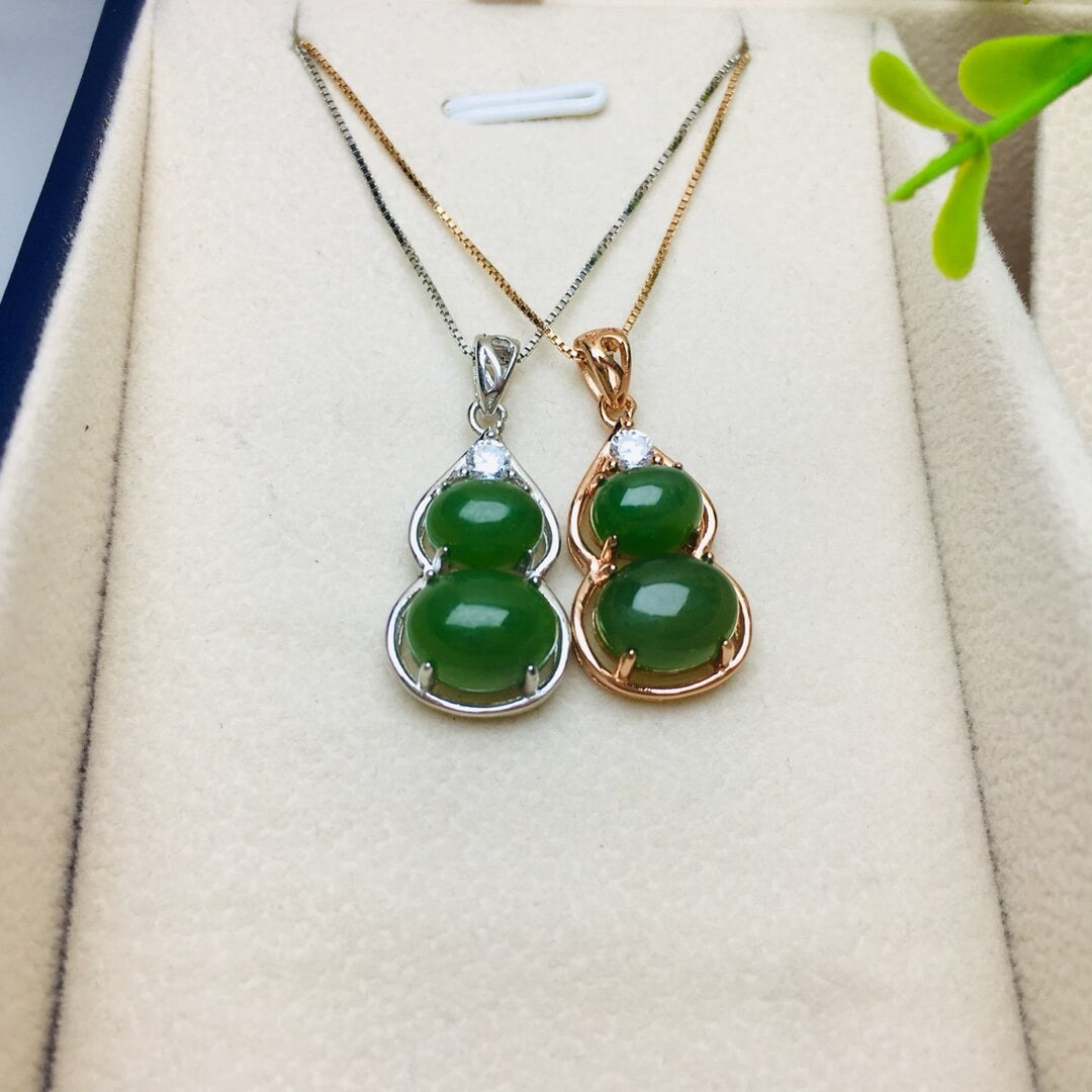 Sterling Silver Pendant with Hotan Jade Egg-Shaped Pendant