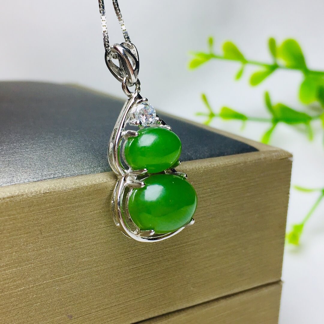 Sterling Silver Pendant with Hotan Jade Egg-Shaped Pendant