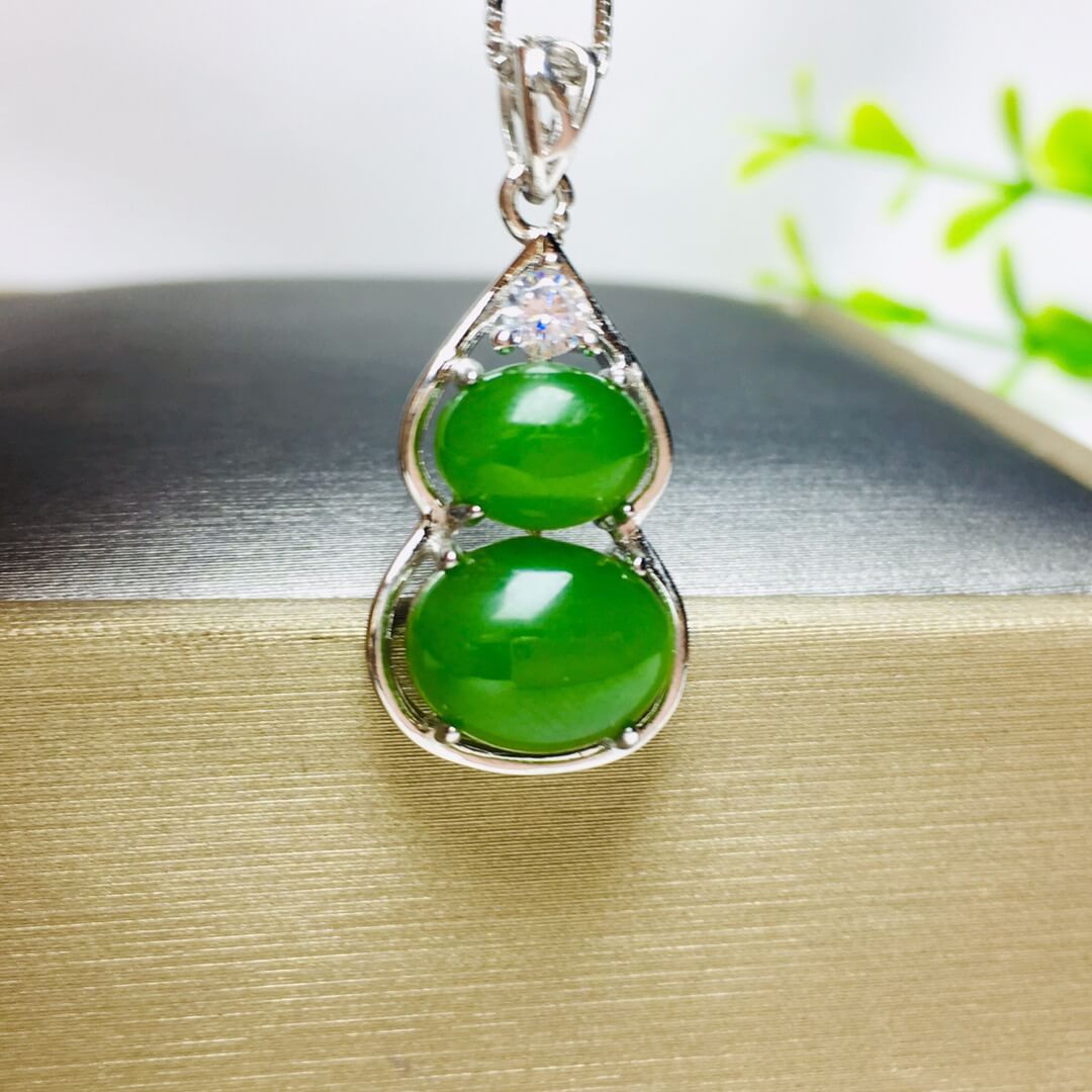 Sterling Silver Pendant with Hotan Jade Egg-Shaped Pendant