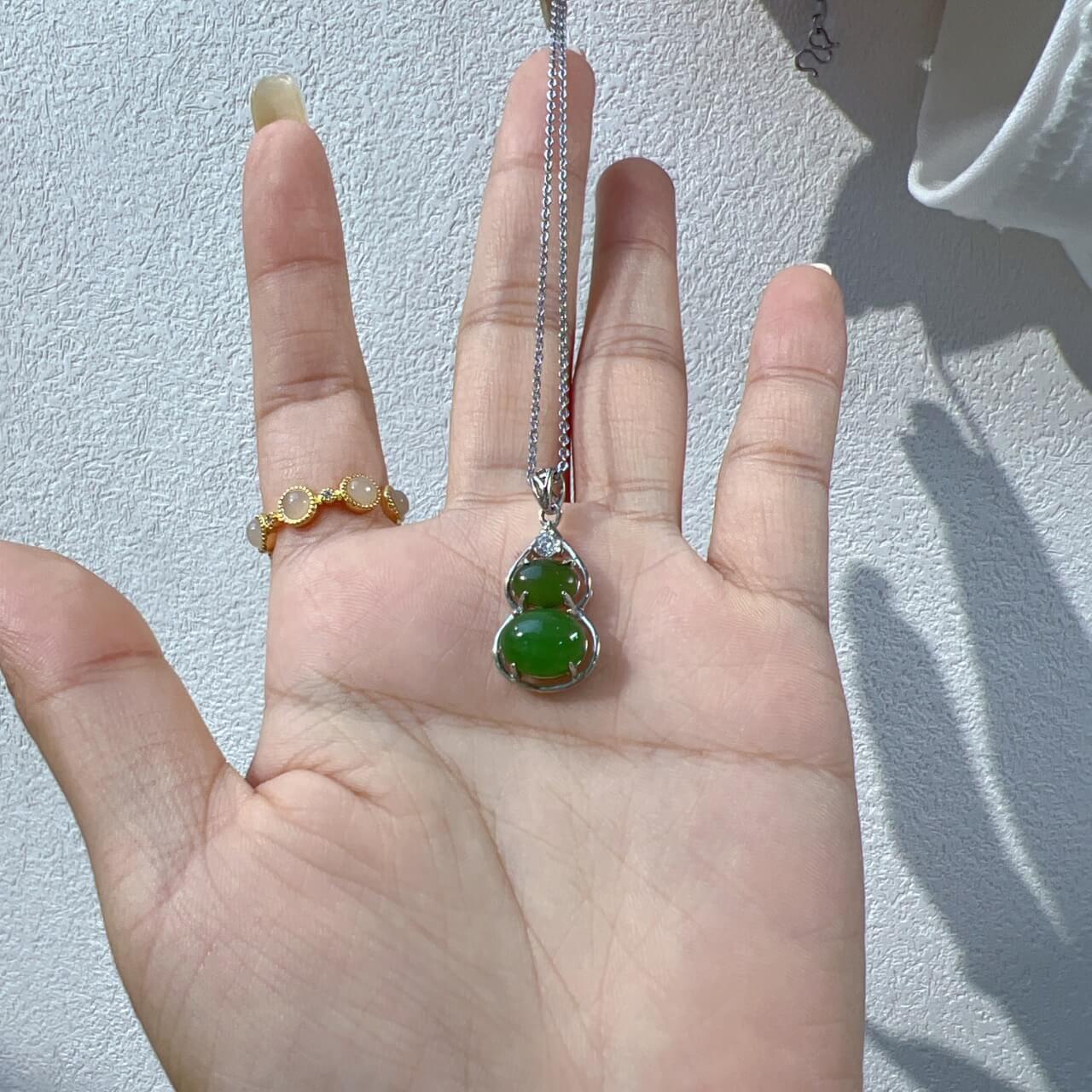Sterling Silver Pendant with Hotan Jade Egg-Shaped Pendant