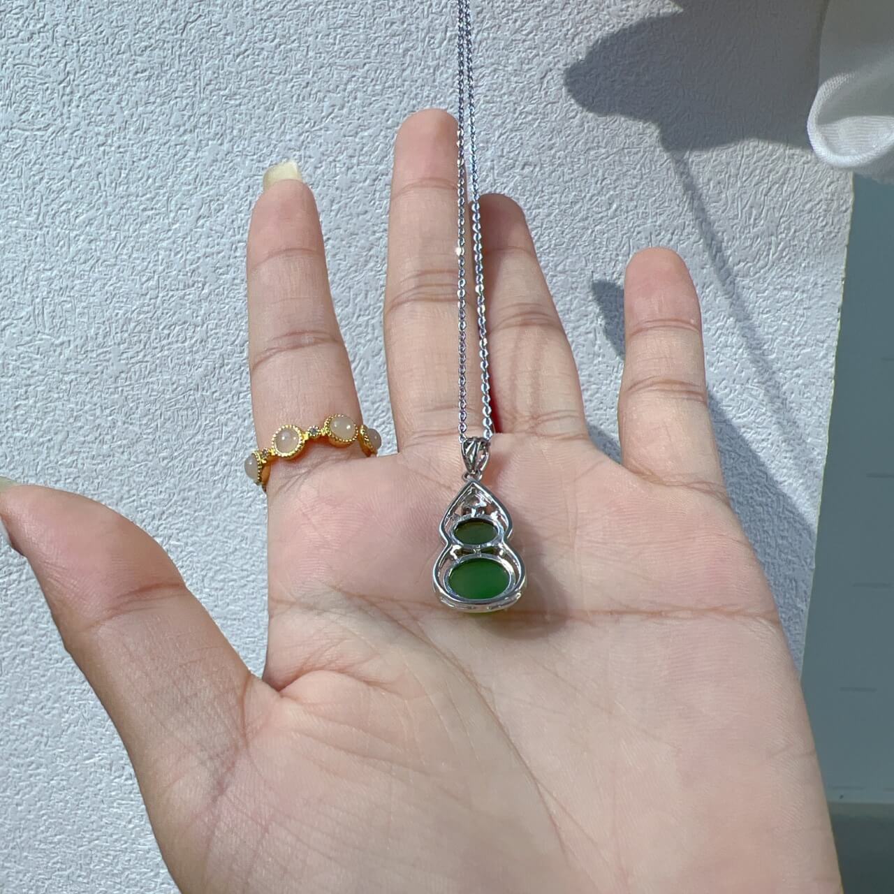 Sterling Silver Pendant with Hotan Jade Egg-Shaped Pendant