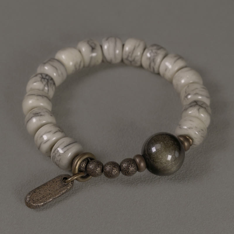Karma Stone Tibetan Yak Bone Gold Sheen Obsidian Brass Bead Strength Bracelet