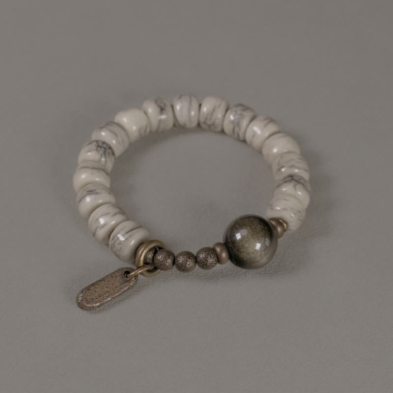Karma Stone Tibetan Yak Bone Gold Sheen Obsidian Brass Bead Strength Bracelet