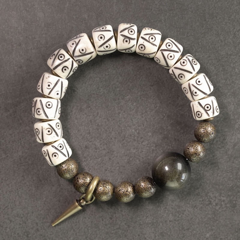Karma Stone Tibetan Yak Bone Gold Sheen Obsidian Brass Bead Strength Bracelet